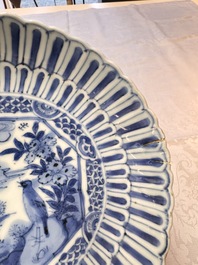 Four Chinese 'Kraak' blue and white plates with a bird on a rock, Wanli