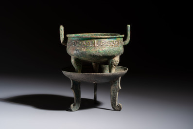 An inscribed Chinese archaic bronze food vessel and stand, You Pan Ding 有盤鼎, Western Zhou
