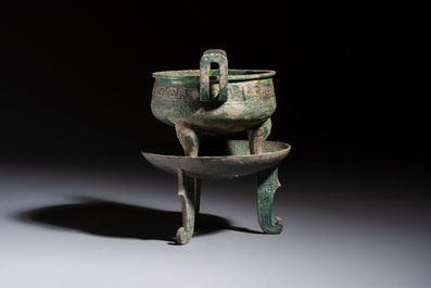 An inscribed Chinese archaic bronze food vessel and stand, You Pan Ding 有盤鼎, Western Zhou