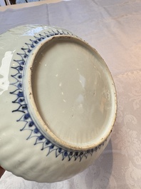 Four Chinese 'Kraak' blue and white plates with a bird on a rock, Wanli