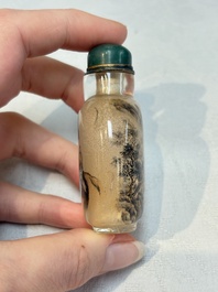 A Chinese rock crystal and two glass inside painted snuff bottles, 19/20th C., with a signed copy of 'Chinese Inside Painting of the Modern Age', 2005