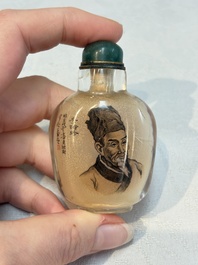 A Chinese rock crystal and two glass inside painted snuff bottles, 19/20th C., with a signed copy of 'Chinese Inside Painting of the Modern Age', 2005