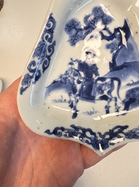 A pair of Chinese blue and white 'Rider on Horseback' sweetmeat dishes, Kangxi