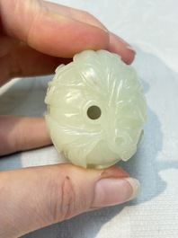 A Chinese carved jade melon-form snuff bottle with a red coral stopper, 1820-1880