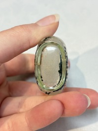 A Chinese rock crystal and two glass inside painted snuff bottles, 19/20th C., with a signed copy of 'Chinese Inside Painting of the Modern Age', 2005