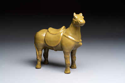 A Chinese teadust-glazed model of a horse on a wooden stand, Republic