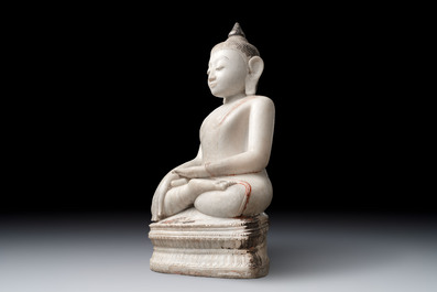 A monumental Burmese white marble Post-Pagan Buddha with traces of gilt-lacquer, Ava Kingdom, 17th C