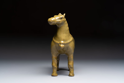 A Chinese teadust-glazed model of a horse on a wooden stand, Republic