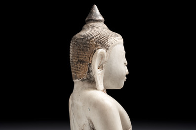A monumental Burmese white marble Post-Pagan Buddha with traces of gilt-lacquer, Ava Kingdom, 17th C