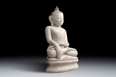 A monumental Burmese white marble Post-Pagan Buddha with traces of gilt-lacquer, Ava Kingdom, 17th C
