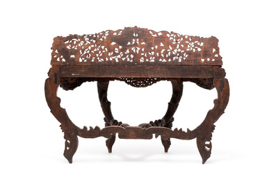 A finely carved Anglo-Indian rosewood demi-lune console table with lions, 19th C.