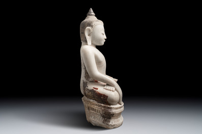 A monumental Burmese white marble Post-Pagan Buddha with traces of gilt-lacquer, Ava Kingdom, 17th C
