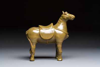 A Chinese teadust-glazed model of a horse on a wooden stand, Republic