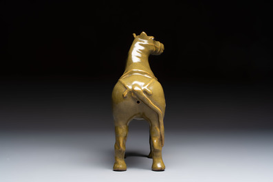 A Chinese teadust-glazed model of a horse on a wooden stand, Republic