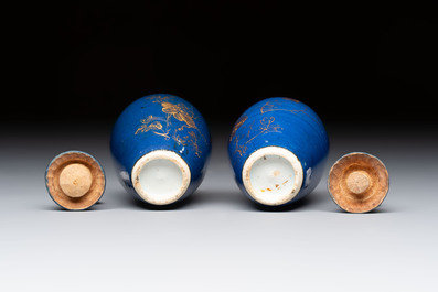 A pair of Chinese gilt-decorated powder-blue-ground miniature vases and wooden covers, 18th C.