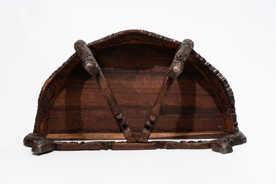 A finely carved Anglo-Indian rosewood demi-lune console table with lions, 19th C.
