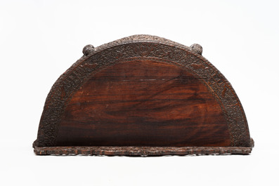 A finely carved Anglo-Indian rosewood demi-lune console table with lions, 19th C.