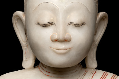 A monumental Burmese white marble Post-Pagan Buddha with traces of gilt-lacquer, Ava Kingdom, 17th C