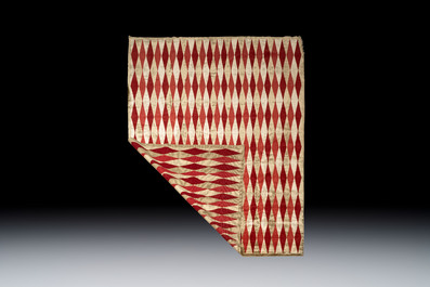 A hand-knotted wool and silk carpet with a rhombic design, Ferdows, Iran, 20th C.