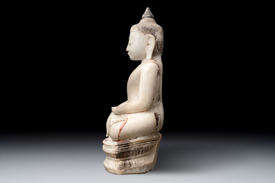 A monumental Burmese white marble Post-Pagan Buddha with traces of gilt-lacquer, Ava Kingdom, 17th C