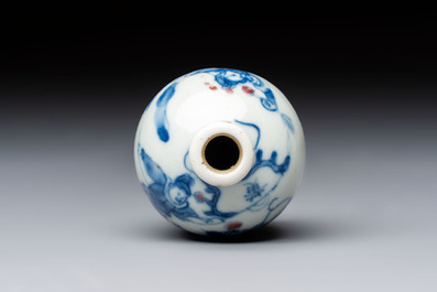 A Chinese blue, white and copper-red 'Romance of the Three Kingdoms' snuff bottle, Yongzheng mark, 19th C.