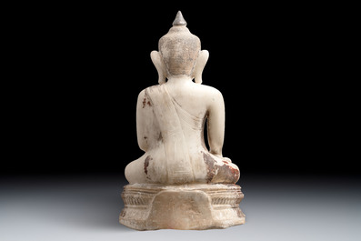A monumental Burmese white marble Post-Pagan Buddha with traces of gilt-lacquer, Ava Kingdom, 17th C