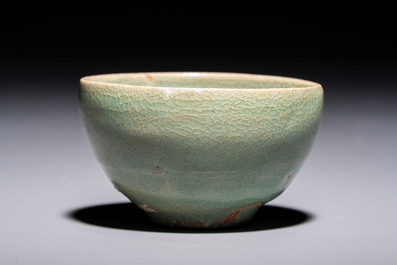 A fine Korean celadon tea bowl with its original stand, Goryeo, 12th C.