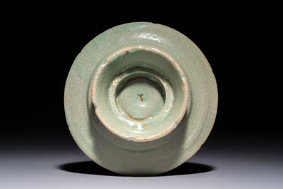 A fine Korean celadon tea bowl with its original stand, Goryeo, 12th C.