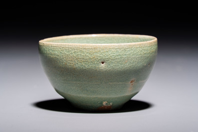 A fine Korean celadon tea bowl with its original stand, Goryeo, 12th C.