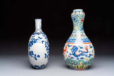 A Chinese blue and white moonflask vase and a wucai garlic-mouth bottle vase, Yongle and Wanli mark, 20th C.