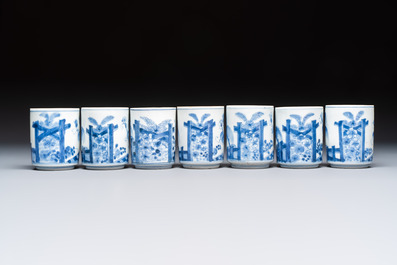 A Japanese blue and white plate, eight cups, and two gilt-lacquered porcelain cups, 19/20th C.