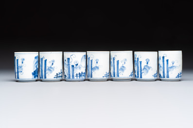 A Japanese blue and white plate, eight cups, and two gilt-lacquered porcelain cups, 19/20th C.