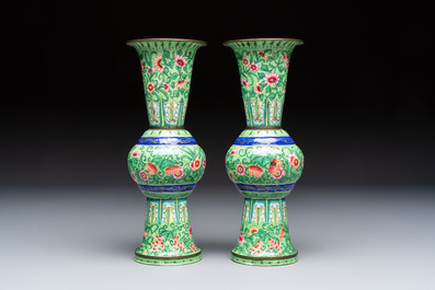 A Chinese Canton enamel green-ground three-piece altar set, 19th C.