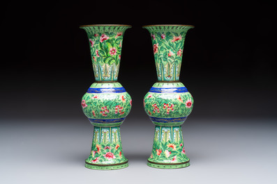 A Chinese Canton enamel green-ground three-piece altar set, 19th C.