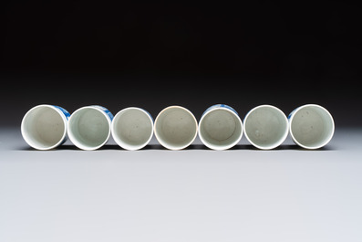 A Japanese blue and white plate, eight cups, and two gilt-lacquered porcelain cups, 19/20th C.