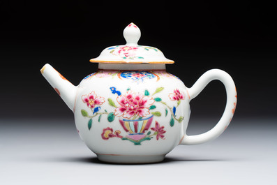 A Chinese famille rose teapot and cover with floral design and three cups, Qianlong