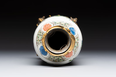 A gilt-bronze-mounted Chinese famille verte vase, a powder-blue-ground bowl and a jar, 19th C.