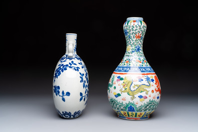 A Chinese blue and white moonflask vase and a wucai garlic-mouth bottle vase, Yongle and Wanli mark, 20th C.