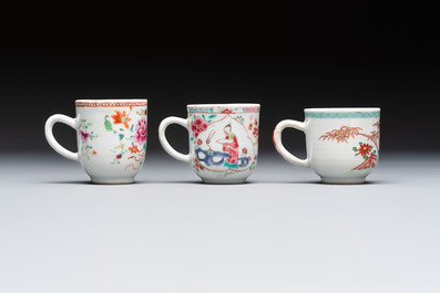 A Chinese famille rose teapot and cover with floral design and three cups, Qianlong