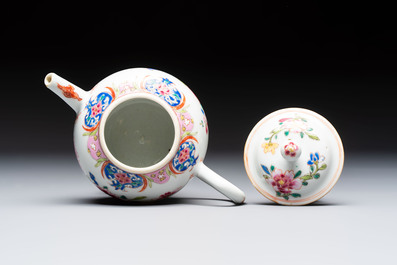 A Chinese famille rose teapot and cover with floral design and three cups, Qianlong