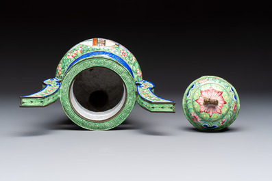 A Chinese Canton enamel green-ground three-piece altar set, 19th C.