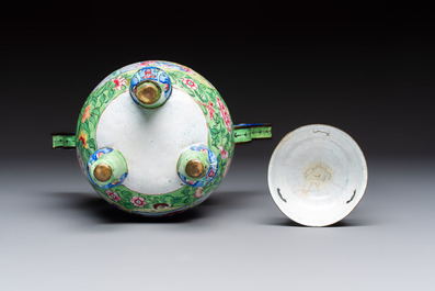 A Chinese Canton enamel green-ground three-piece altar set, 19th C.