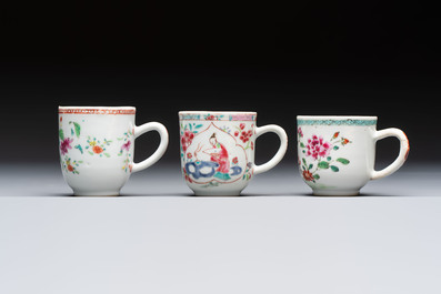 A Chinese famille rose teapot and cover with floral design and three cups, Qianlong