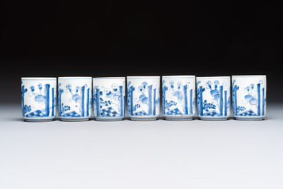 A Japanese blue and white plate, eight cups, and two gilt-lacquered porcelain cups, 19/20th C.