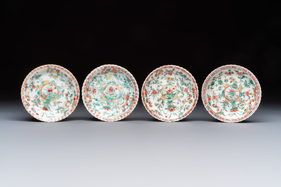 Four Chinese famille verte cups and seven saucers, 19th C.