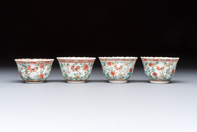 Four Chinese famille verte cups and seven saucers, 19th C.
