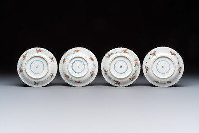 Four Chinese famille verte cups and seven saucers, 19th C.