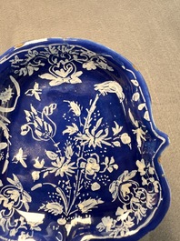 An extremely rare Dutch Delft 'Persian Blue' shield-shaped condiment dish, late 17th C.