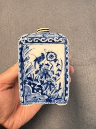 A pair of blue and white Dutch Delft square tea caddies and covers, 18th C.