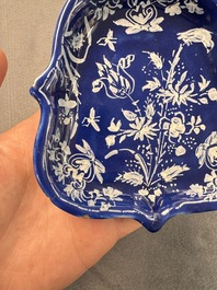 An extremely rare Dutch Delft 'Persian Blue' shield-shaped condiment dish, late 17th C.